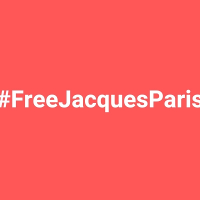 Image avec le texte # Free Jacques Paris sur fond rouge